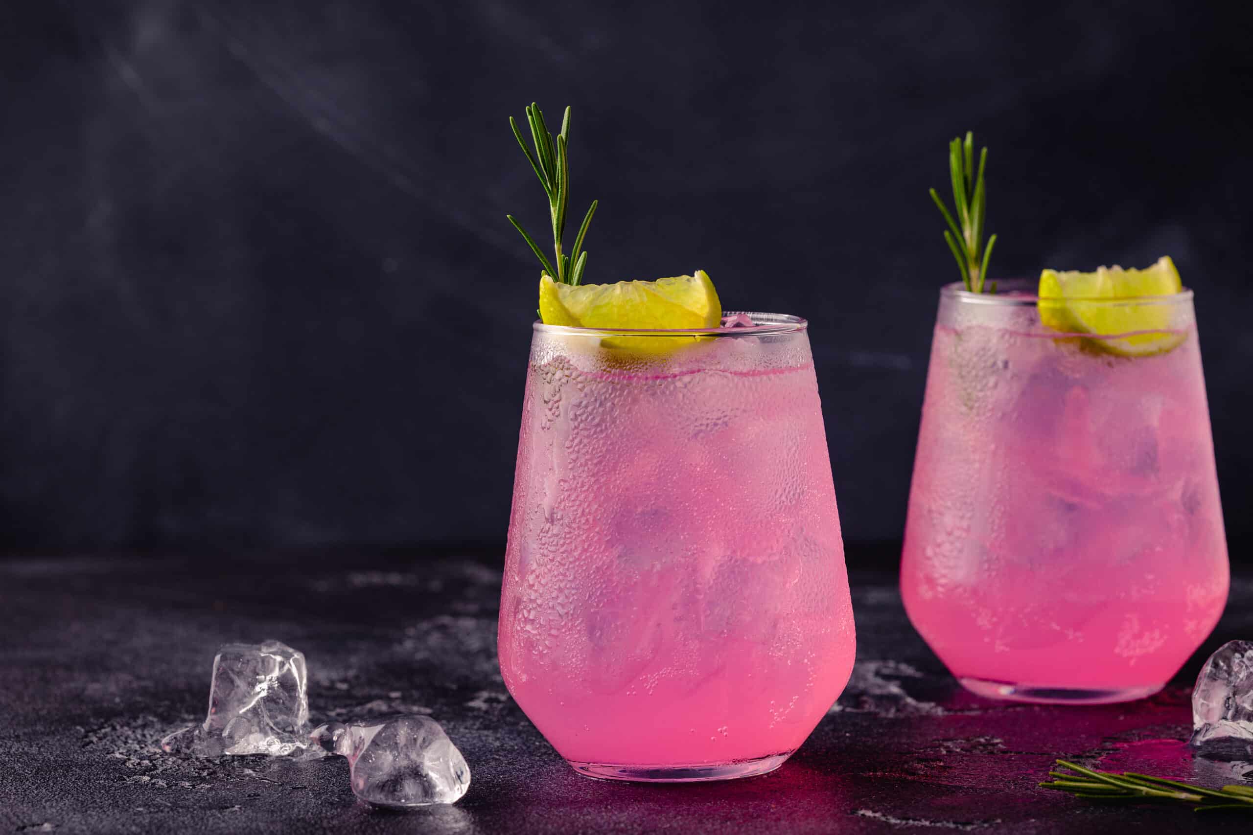 Refreshing pink drink or cocktail with ice